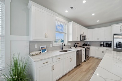 Oceanfront elegance meets coastal convenience in this stunning