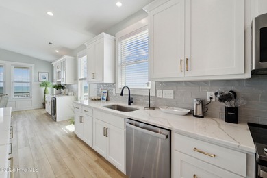 Oceanfront elegance meets coastal convenience in this stunning