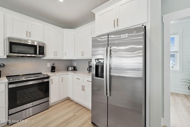 Oceanfront elegance meets coastal convenience in this stunning