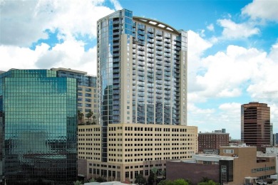 Welcome to this stunning 11th-floor 2 bed, 2 bath condo with