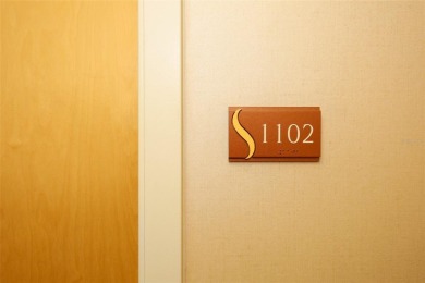 Welcome to this stunning 11th-floor 2 bed, 2 bath condo with