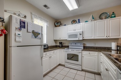 Discover your perfect coastal getaway in this inviting, fully