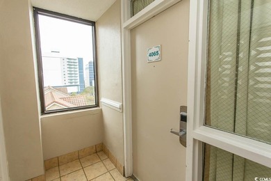 This cozy updated 1-bedroom, 1.5-bath oceanview end unit in