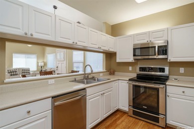 Welcome to Spinnaker Townhomes - Unit 6006, a rare single-level