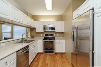 Welcome to Spinnaker Townhomes - Unit 6006, a rare single-level