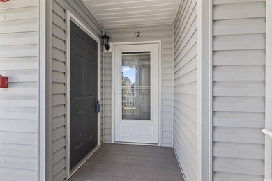 **Top-Floor End Unit in Elevator Building!**   This beautifully