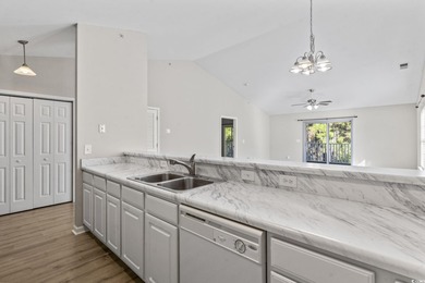 **Top-Floor End Unit in Elevator Building!**   This beautifully