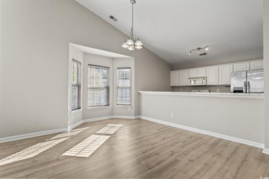 **Top-Floor End Unit in Elevator Building!**   This beautifully