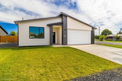 Modern ranch style one-story home with level entry. Built in