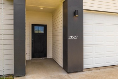 Modern ranch style one-story home with level entry. Built in