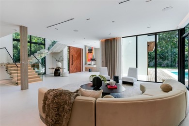 Welcome to CASA GRANDE, a dramatic 7BD/7BA modern residence