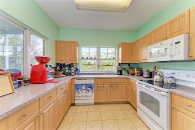 Discover this beautifully remodeled three-story end unit