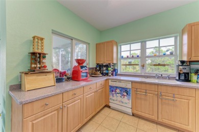 Discover this beautifully remodeled three-story end unit