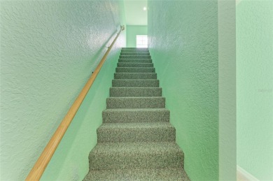 Discover this beautifully remodeled three-story end unit