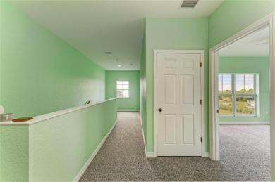 Discover this beautifully remodeled three-story end unit