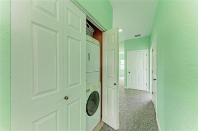 Discover this beautifully remodeled three-story end unit