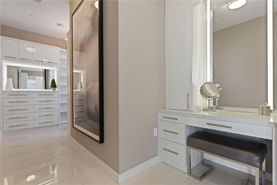 First time on the market, this 4 bed/5 bath penthouse spans 4