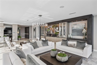 First time on the market, this 4 bed/5 bath penthouse spans 4