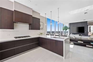 First time on the market, this 4 bed/5 bath penthouse spans 4