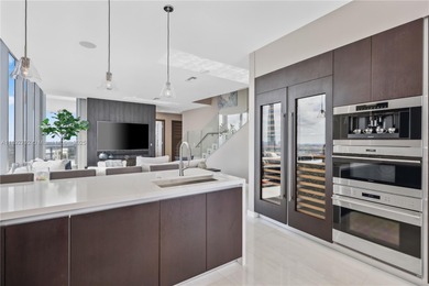 First time on the market, this 4 bed/5 bath penthouse spans 4