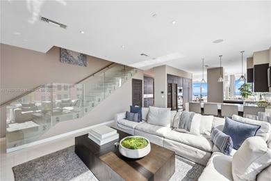 First time on the market, this 4 bed/5 bath penthouse spans 4