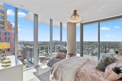 First time on the market, this 4 bed/5 bath penthouse spans 4
