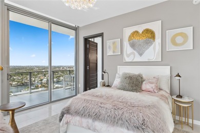 First time on the market, this 4 bed/5 bath penthouse spans 4