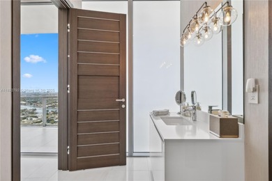 First time on the market, this 4 bed/5 bath penthouse spans 4