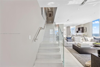 First time on the market, this 4 bed/5 bath penthouse spans 4