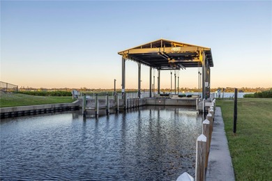 WATERFRONT LIVING IN A BOATING COMMUNITY.  Experience the