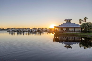 WATERFRONT LIVING IN A BOATING COMMUNITY.  Experience the