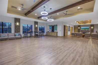 WATERFRONT LIVING IN A BOATING COMMUNITY.  Experience the