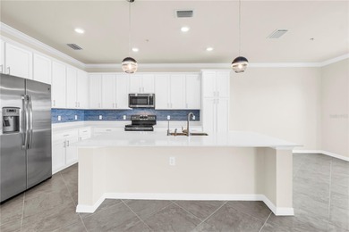 WATERFRONT LIVING IN A BOATING COMMUNITY.  Experience the