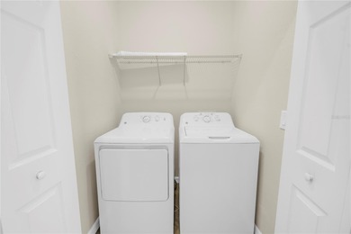 WATERFRONT LIVING IN A BOATING COMMUNITY.  Experience the