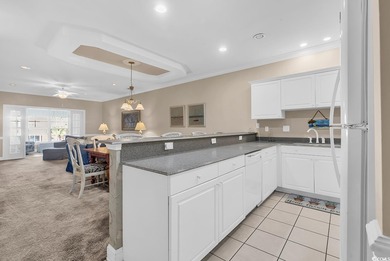 Welcome to this spacious and inviting three-bedroom, two-bath