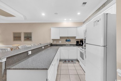 Welcome to this spacious and inviting three-bedroom, two-bath