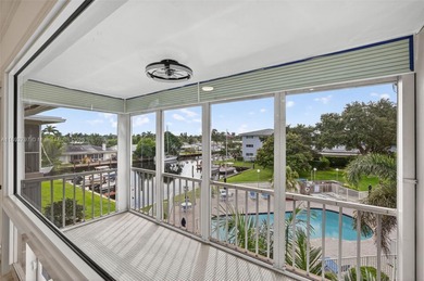 Top-floor unit w/ screened patio over peaceful water & pool