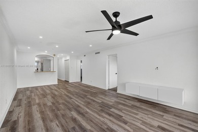 Top-floor unit w/ screened patio over peaceful water & pool