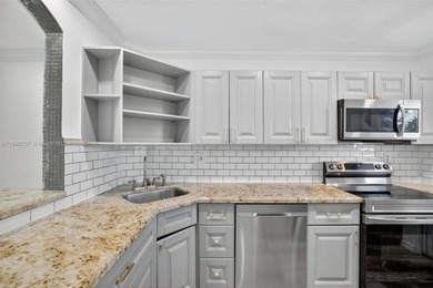 Top-floor unit w/ screened patio over peaceful water & pool