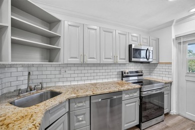 Top-floor unit w/ screened patio over peaceful water & pool