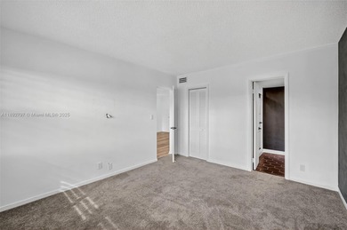 Top-floor unit w/ screened patio over peaceful water & pool