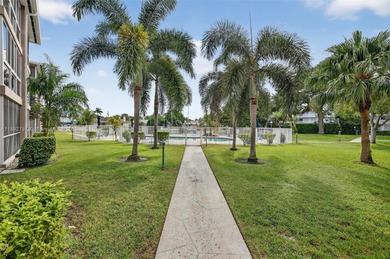 Top-floor unit w/ screened patio over peaceful water & pool