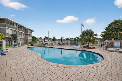 Top-floor unit w/ screened patio over peaceful water & pool