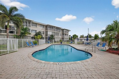 Top-floor unit w/ screened patio over peaceful water & pool