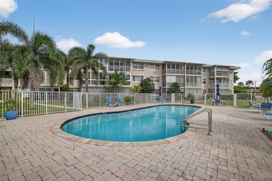 Top-floor unit w/ screened patio over peaceful water & pool