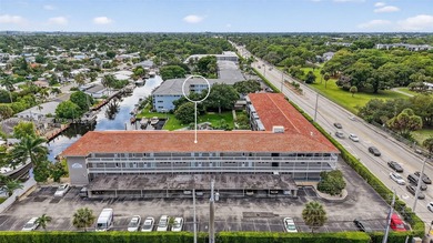 Top-floor unit w/ screened patio over peaceful water & pool