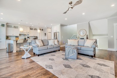 Experience luxury coastal living in this custom-designed 5