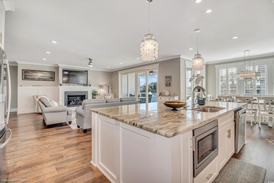 Experience luxury coastal living in this custom-designed 5