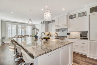 Experience luxury coastal living in this custom-designed 5