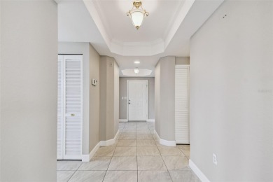 Enjoy luxury waterfront living in this premier fourth floor end